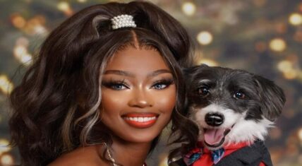 Woman faces criticism for taking Christmas pics with her puppy