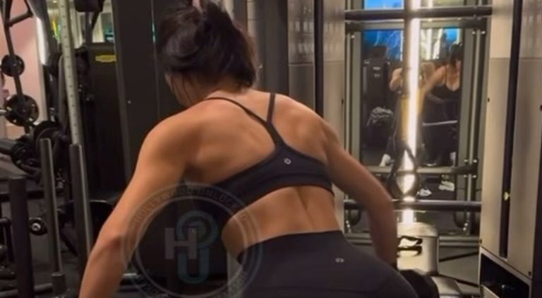 Kim Kardashian shows off toned back in workout video