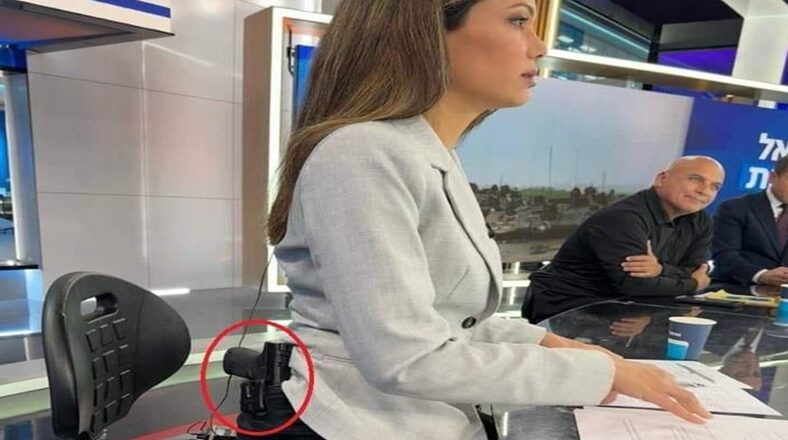 News anchor trends for having pistol on her side during broadcast