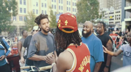 J. Cole receives custom Dreamville bike from Trae Tha Truth