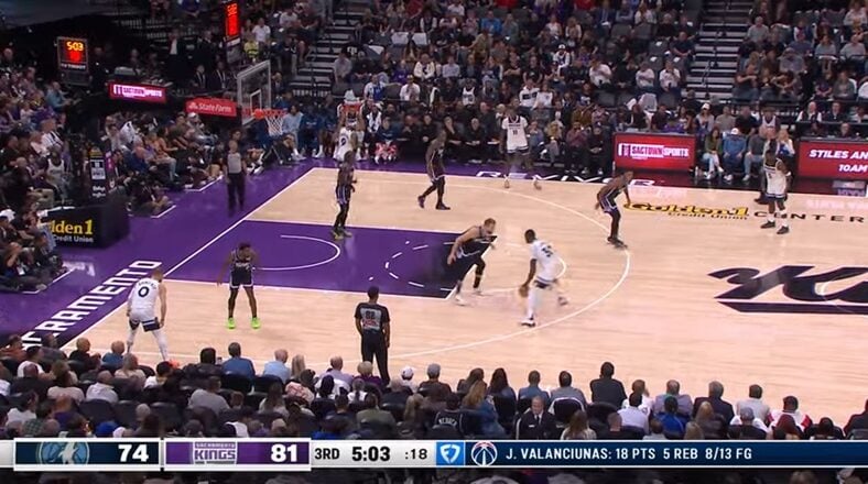 Anthony Edwards and Julius Randle on the court during Timberwolves vs. Kings game