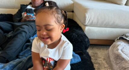 Charvarius Ward's daughter Amani Joy, smiling, in a family moment captured before her passing.
