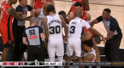 Dillon Brooks and Victor Wembanyama in a heated fight on the court during Spurs vs. Rockets game