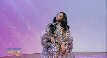 Trina performing "Here We Go" on Tamron Hall in leopard print.