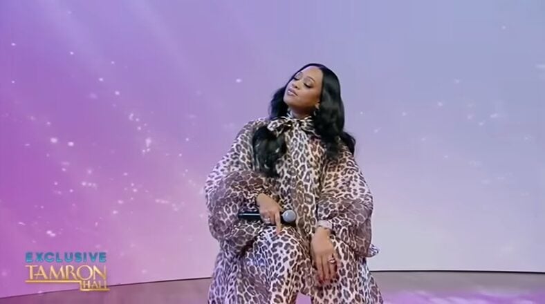 Trina performing "Here We Go" on Tamron Hall in leopard print.
