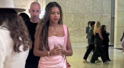Blue Ivy Carter in a pink dress at the 'Wicked' premiere in Los Angeles
