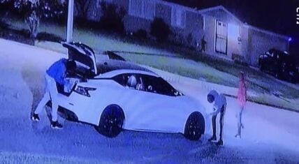 Surveillance footage of masked individuals stealing a 2019 Nissan Maxima