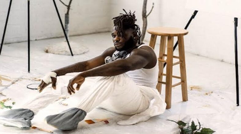 Jesse Luketa, of the Arizona Cardinals, steps out of his NFL persona and into his Afrobeats persona to drop his Gold Linen EP.