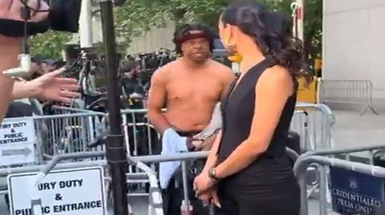 This shirtless man began hurling curse words and insults at this Entertainment Tonight reporter and she lost her composure.
