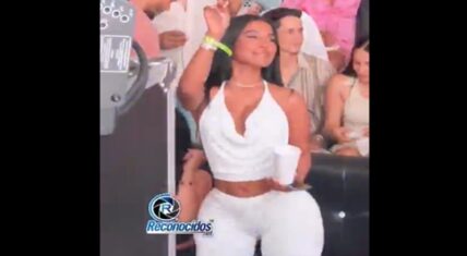 A man went out partying with his girlfriend and wound up in an awkward situation. An attractive woman inadvertently began dancing in front of him. The man was obviously doing all he could to not stare at this woman.