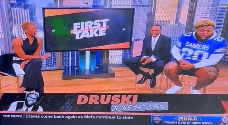During a recent taping of First Take, Druski had a segment with Monica McNutt and Stephen A. Smith. McNutt asked the popular comedian and personality, Druski, about his Sanders jersey, believing it was a Shedeur Sanders jersey. However, Druski corrected McNutt, informing her that it was actually a Barry Sanders jersey.