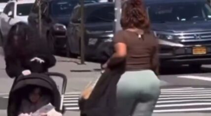A man was recording on a NYC sidewalk, when he captured a Black woman walking past a White woman and her child. The Black woman wound up spitting on the mother and her child.