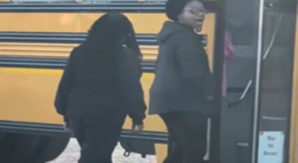 A bus driver for Alpha Academy in Fayetteville, NC is one of the most discussed people on the internet right now. She is the focal point of a viral video where she got into an altercation with the mother of one of her students. The driver claims the student asked her for a hug and then touched her inappropriately, leading to her calling the child out and the mother came to settle matters, resulting in a large altercation that a male parent broke up.