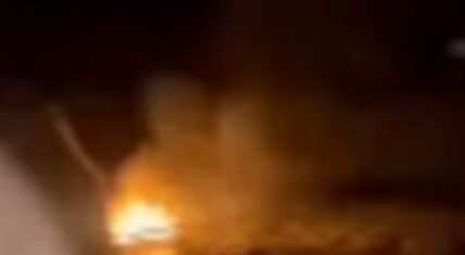 Nighttime bonfire scene from the viral Lenoir County assault video outside Grifton, showing flames in the darkness during the May 24, 2026 incident.
