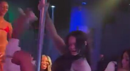 Rihanna dancing on the pole at Magic City strip club in Atlanta, smiling while interacting with performers during her night out with A$AP Rocky on June 11, 2026.